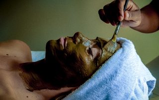 Woman being given a Facial