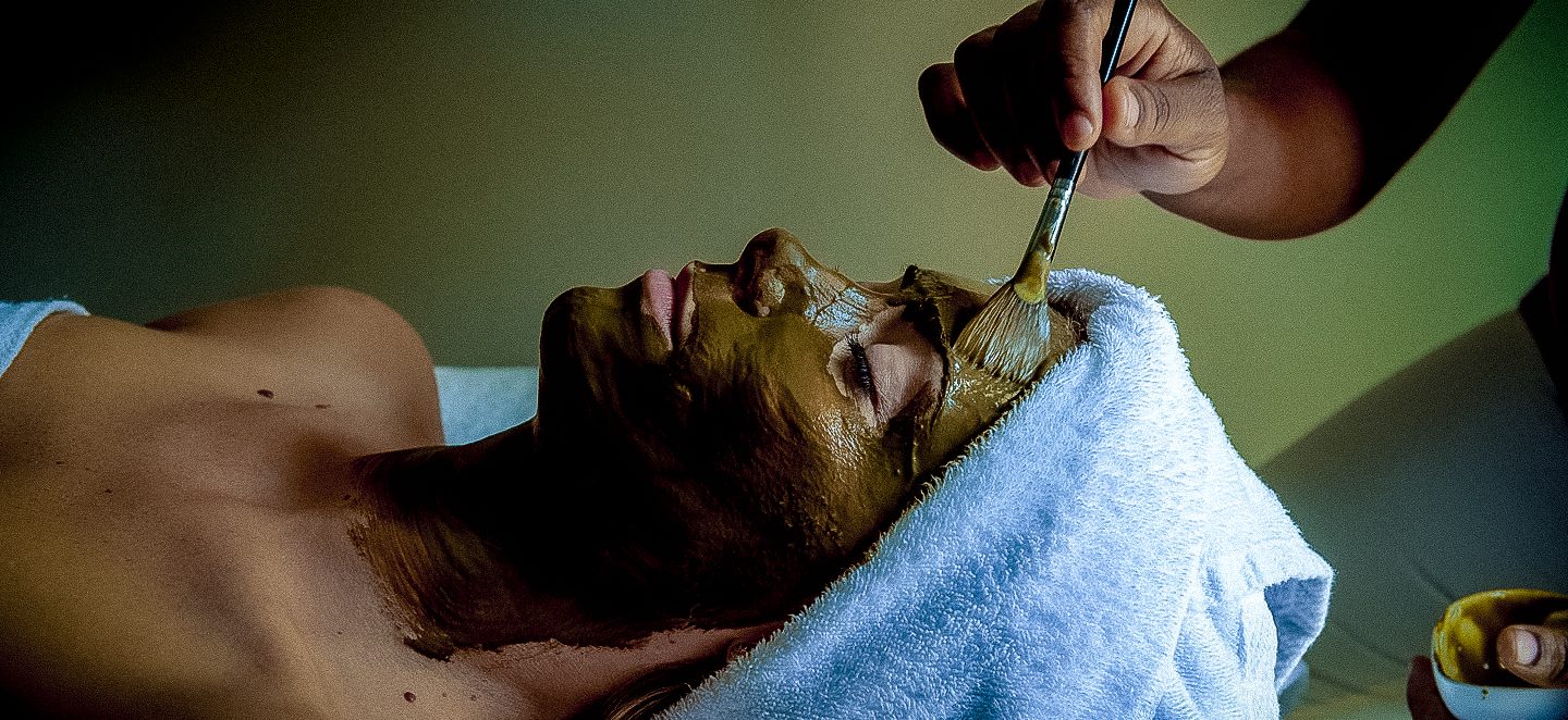 Woman being given a Facial