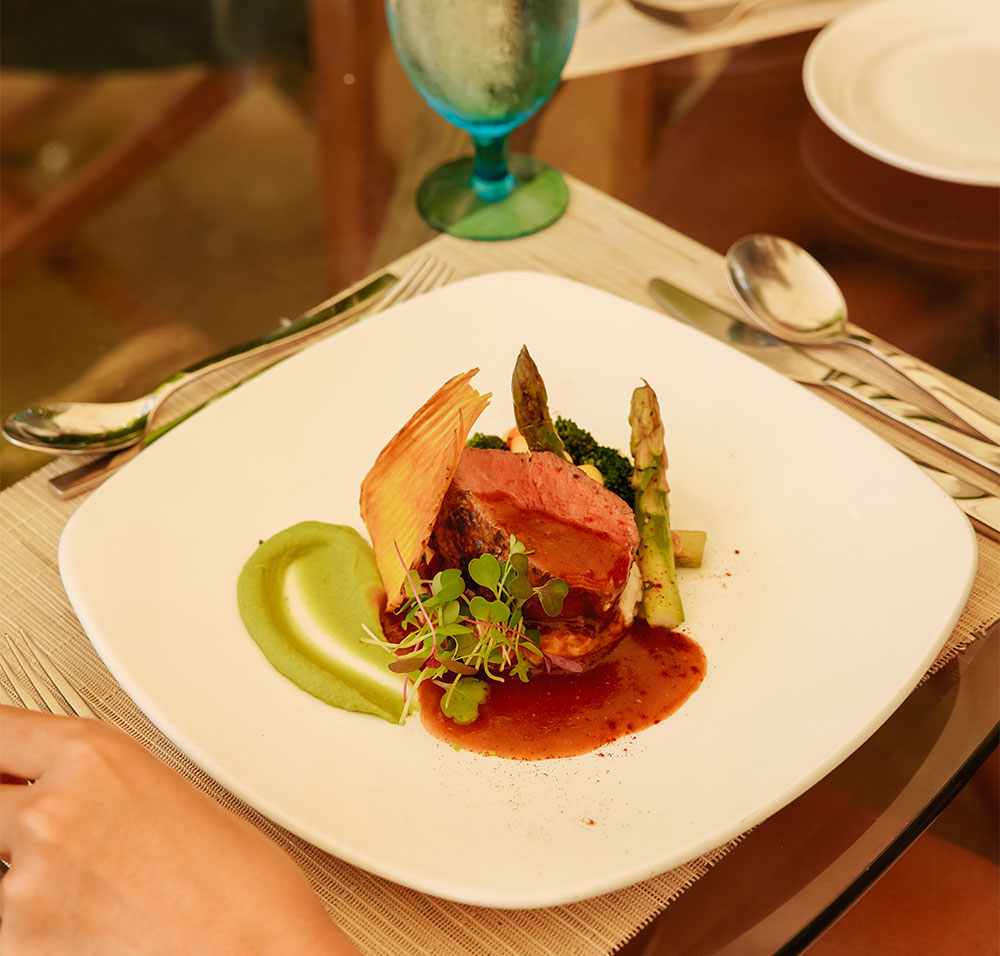 StolenTime Cuisine White Plate with Tender Lamb, Asparagus